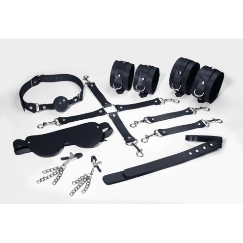 Набір Feral Feelings BDSM Kit 7 Black, наручники, поножі, конектор, маска, паддл, кляп, затискачі