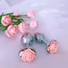 Металлическая анальная пробка с декоративной розочкой